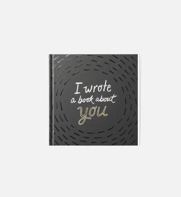 i wrote a book about you Black book with handwritten title I wrote this book about you